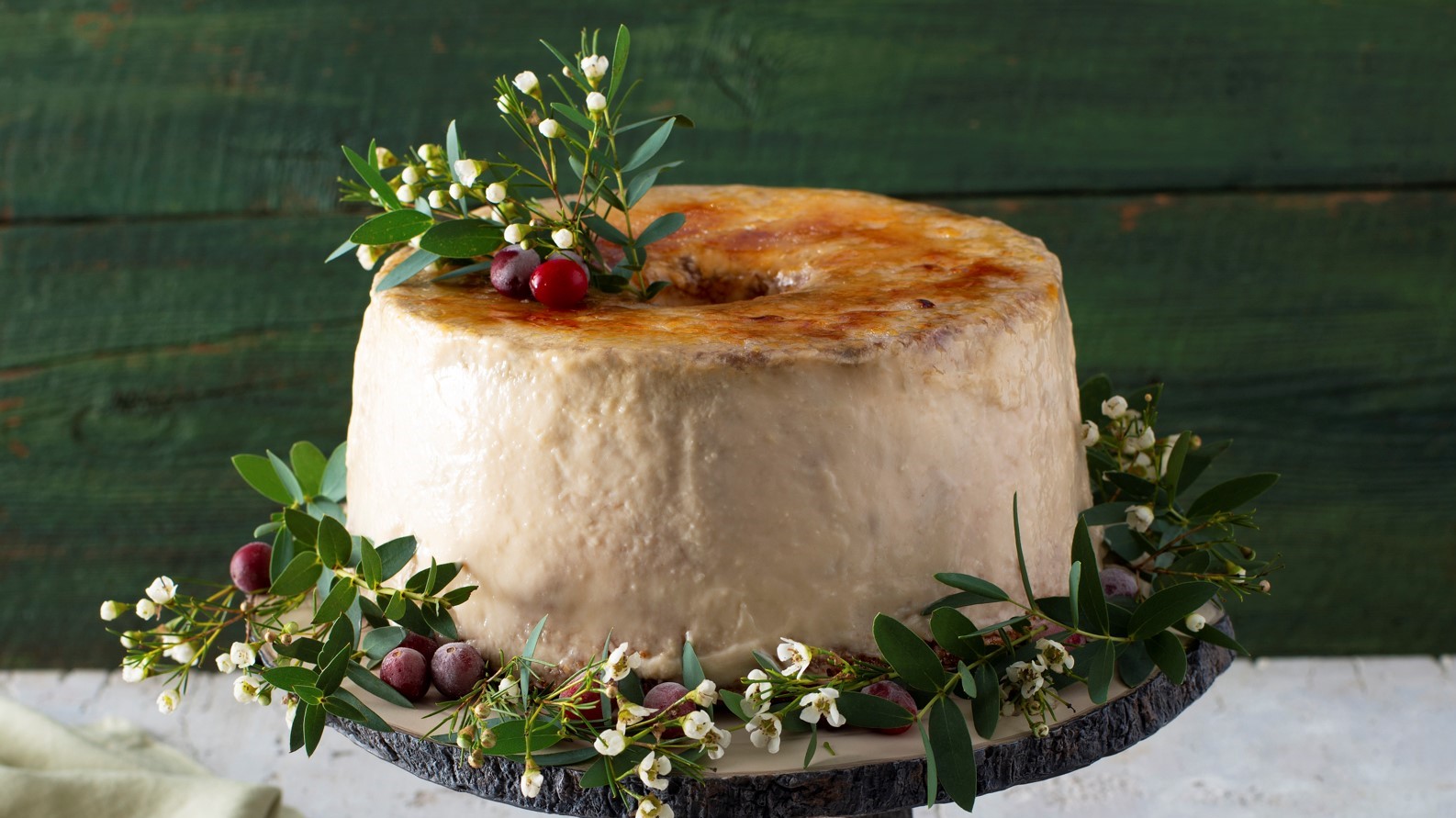 Like two desserts in one, this angel food cake is topped with pudding and sugar, then torched to create the iconic brûlée topping. 