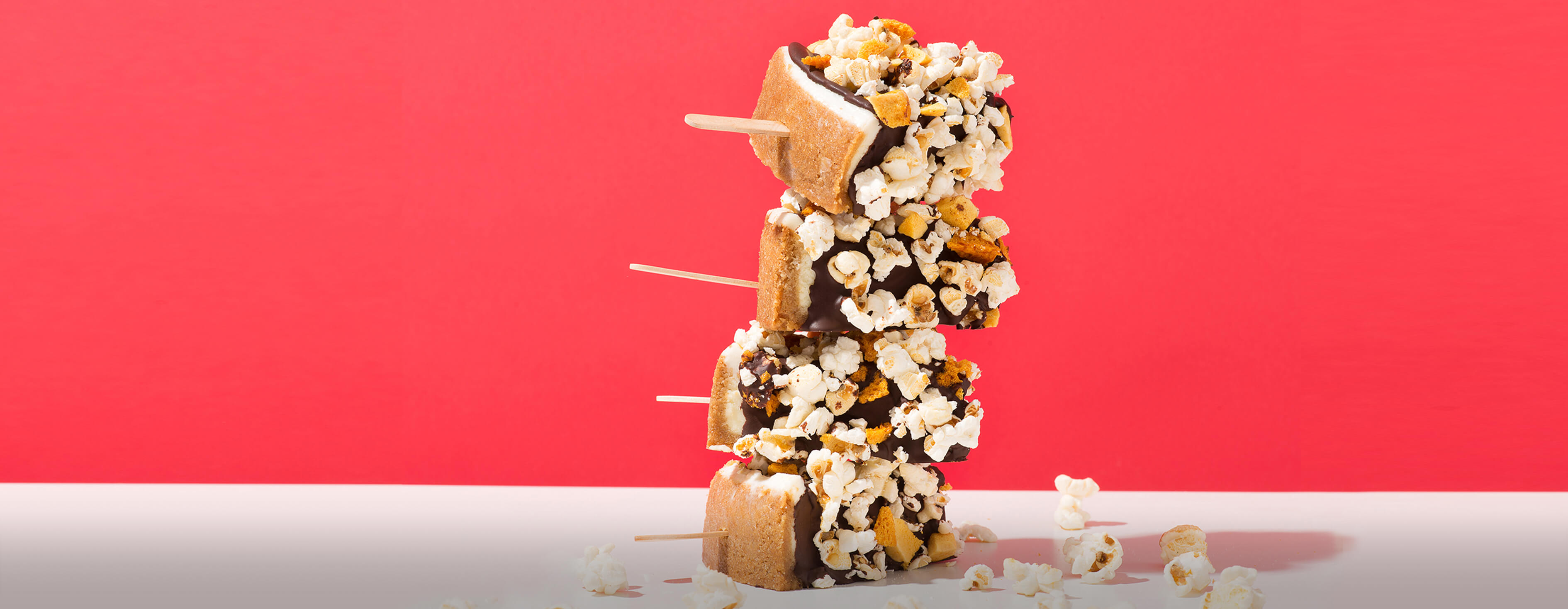 Popcorn-Coated Cheesecake on a Stick